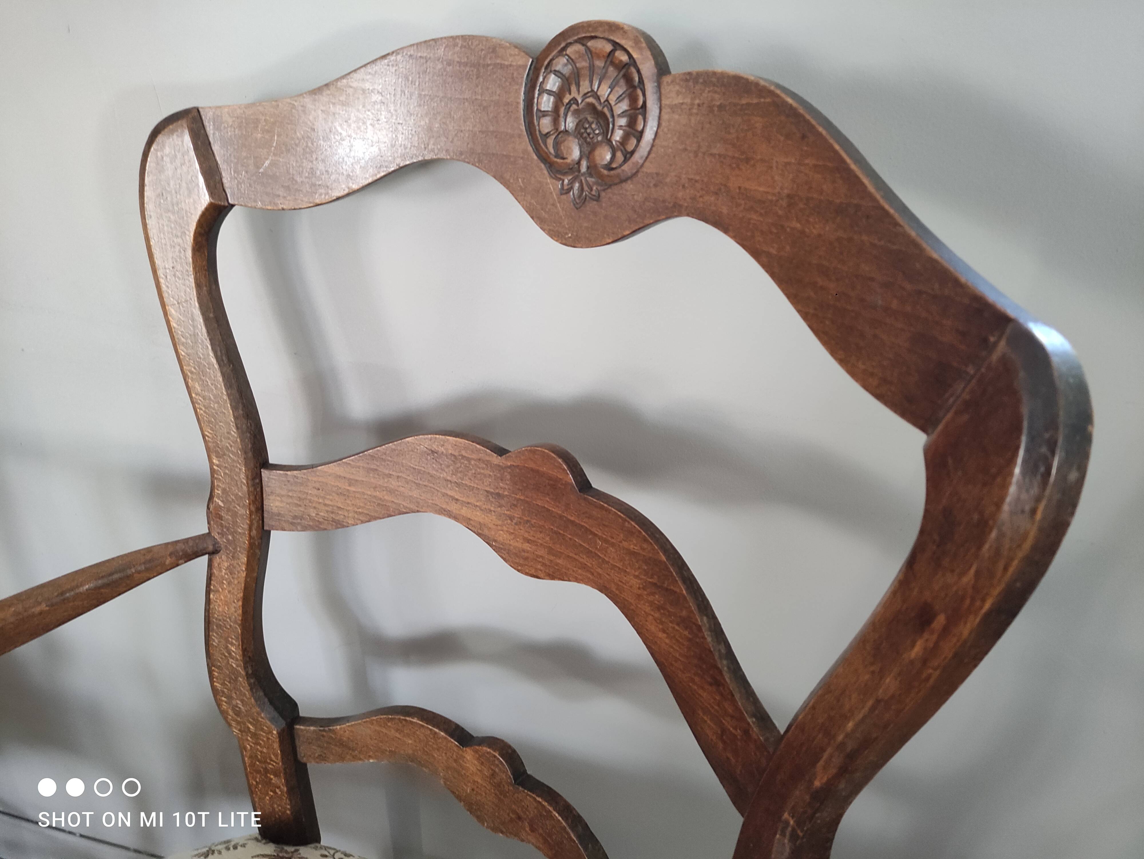 Pair of Provencal armchairs in brown wood and floral fabric