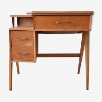 Desk and its Singer integrated sewing machine, 1962