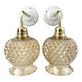 Pair of golden globe wall lights