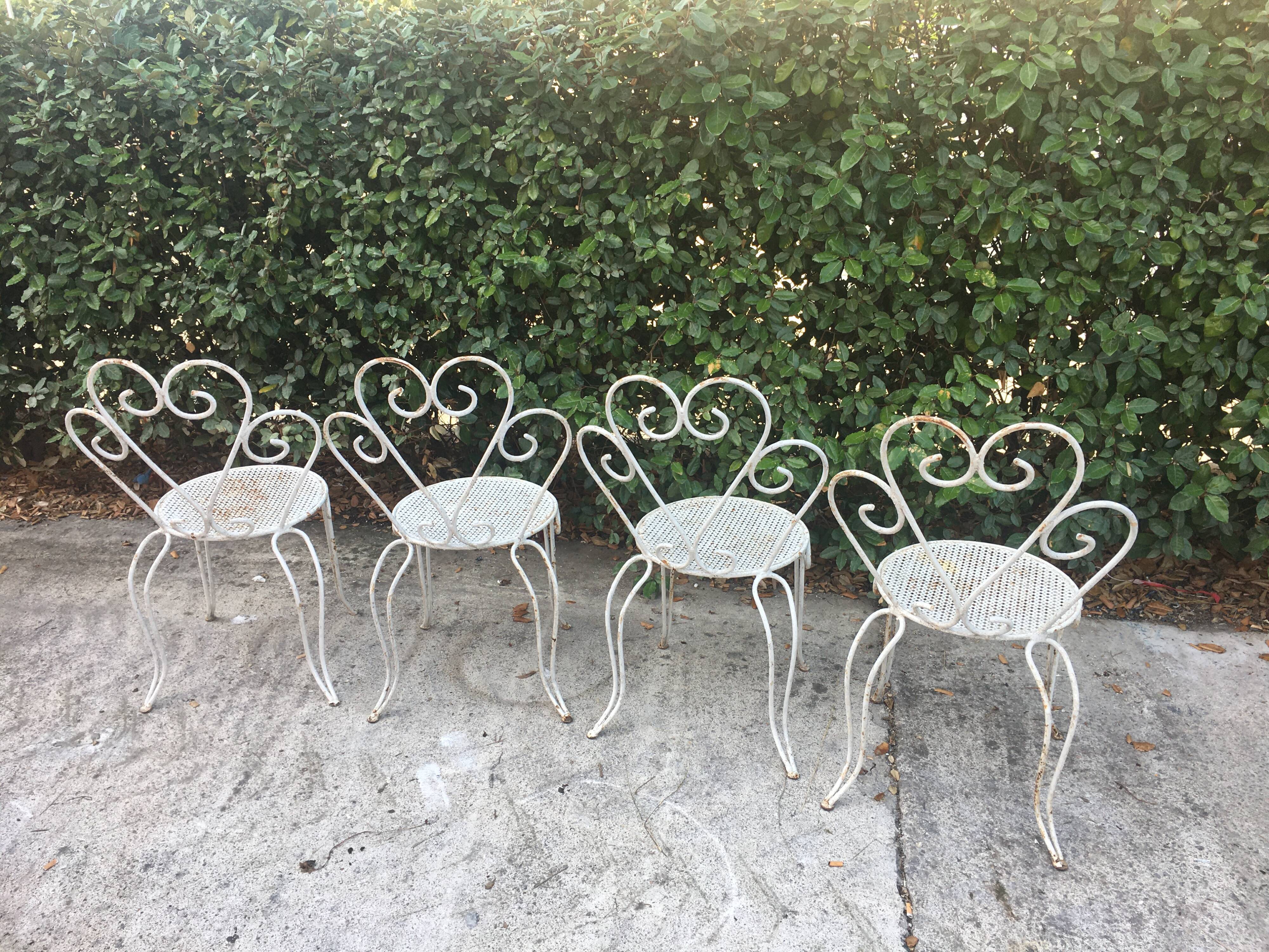 Set of 4 wrought iron chairs