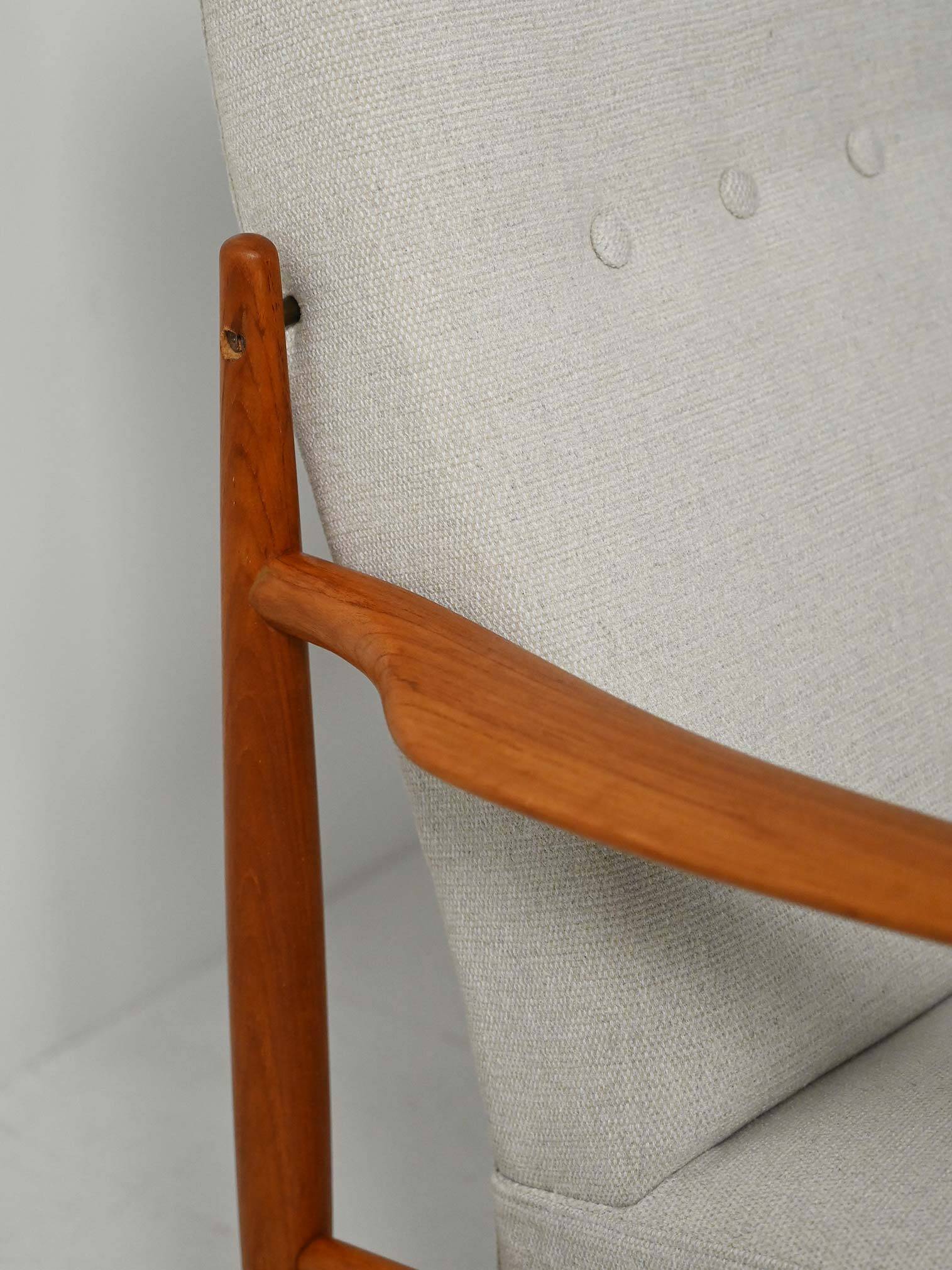 Pair of Scandinavian teak armchairs, 1950s–60s