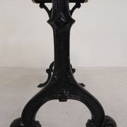 Bistro table with an oak top on a cast iron base, 1930s.