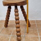 Rustic solid wood tripod stool with turned legs, 45 cm high