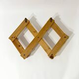 Accordion wall coat rack in solid pine