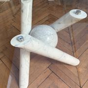 Dining table with glass top and marble base, Ligne Roset.