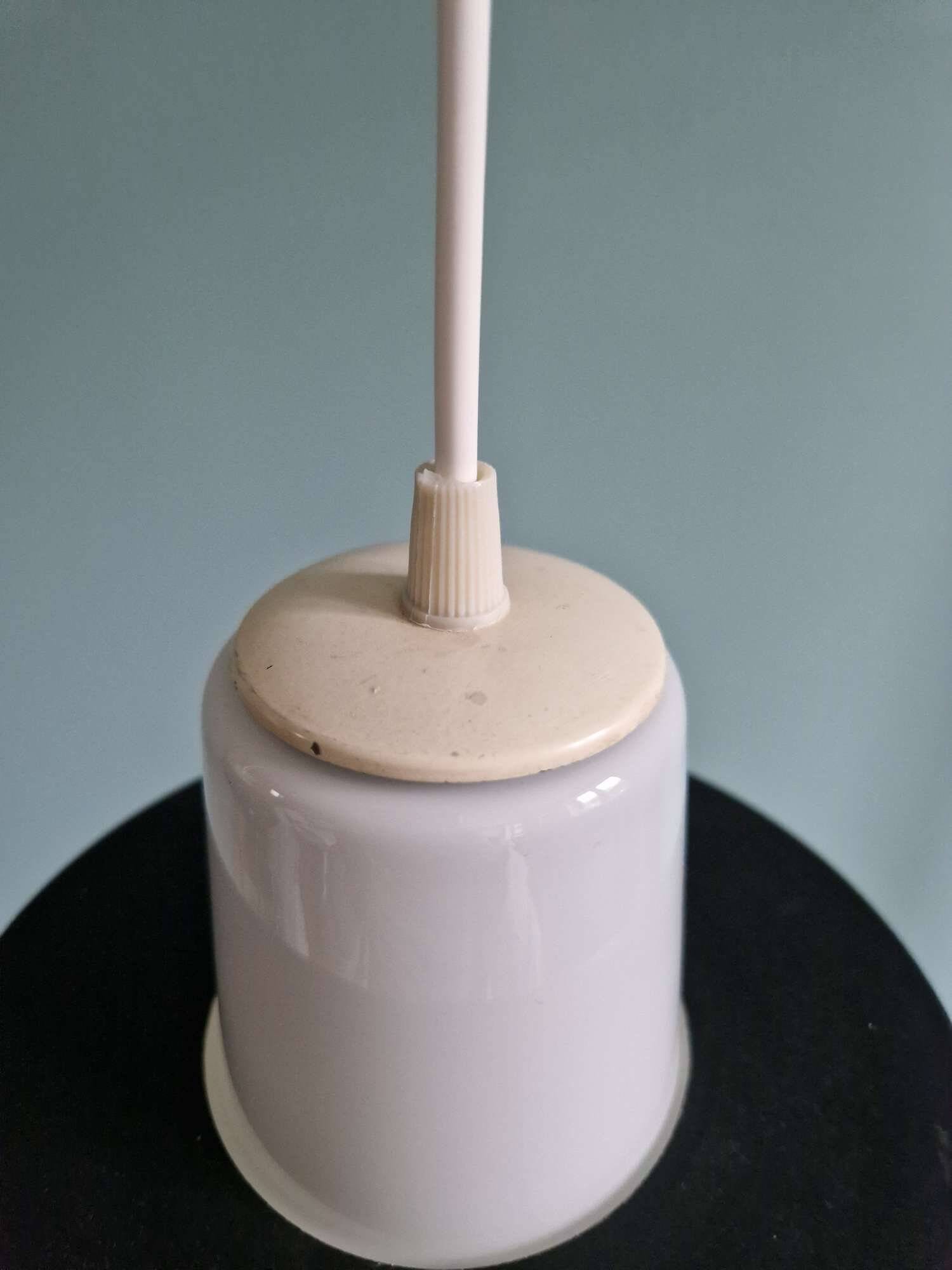 A pair of Scandinavian pendant lights in white opaline and black lacquered metal, 1960.