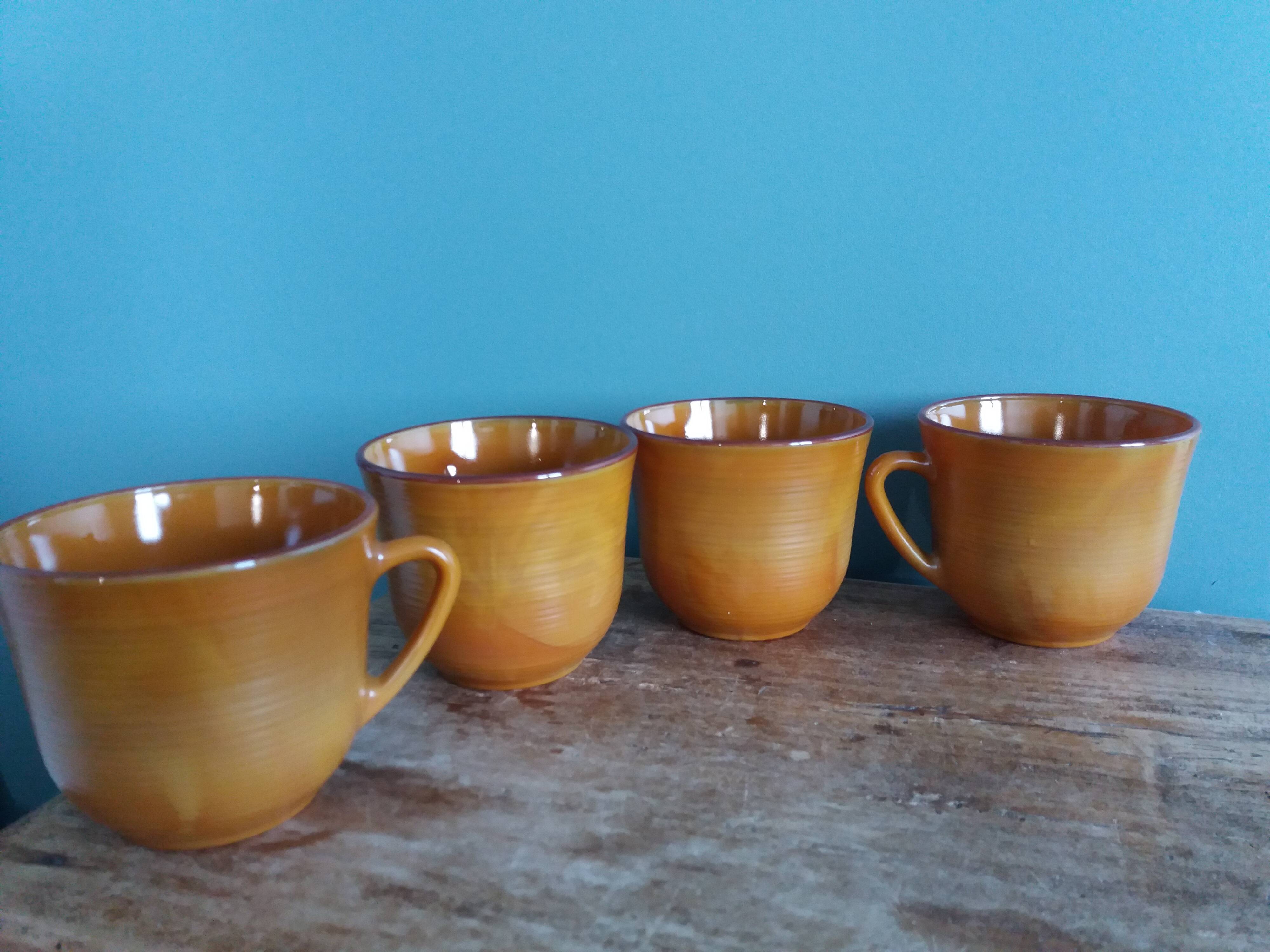 Large Arcopal France Volcan model mugs from 1970, caramel mustard