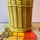 Yellow painted wicker umbrella stand - 1970s