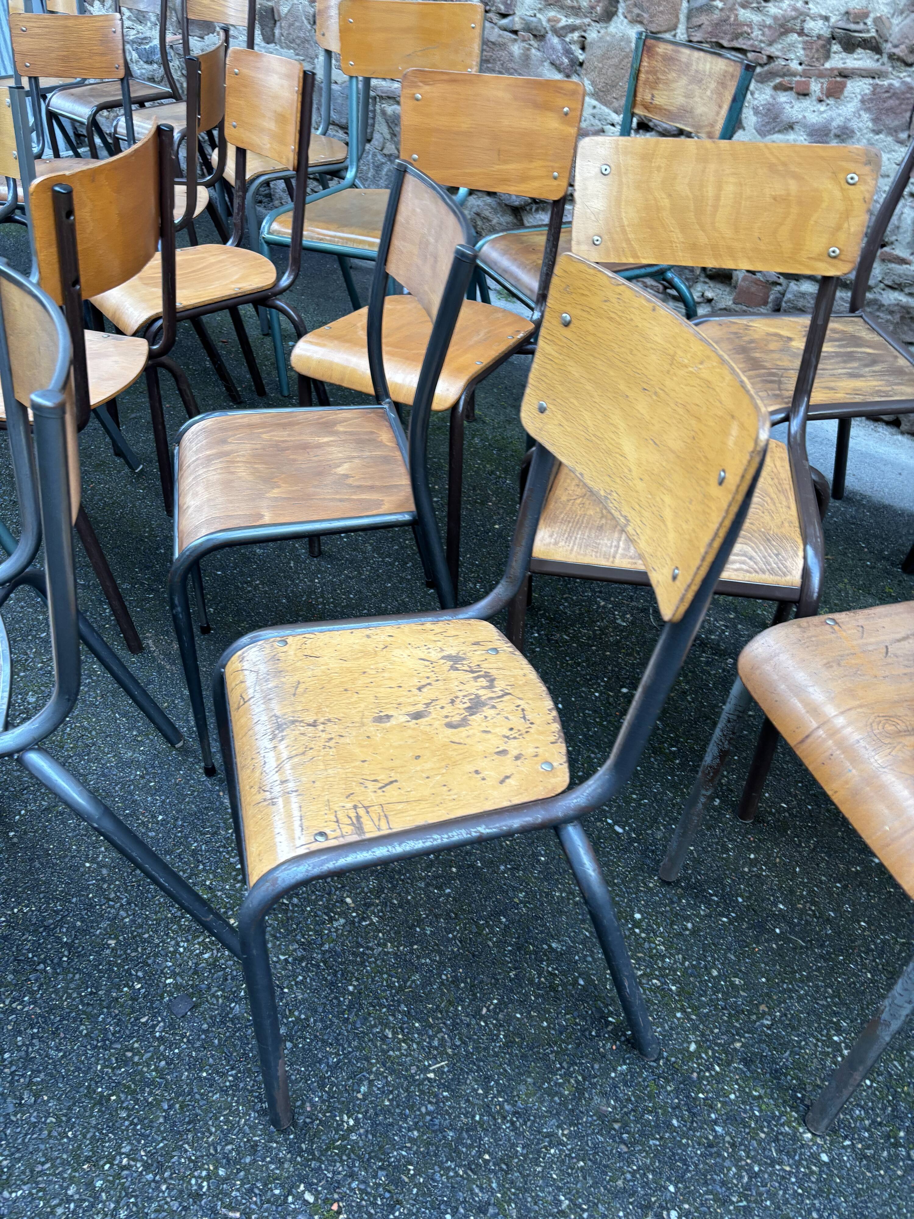 30 mismatched vintage industrial school chairs MULLCA tube & wood