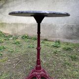 Bistro table with cast iron and marble legs