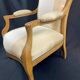 Fauteuil Voltaire XIXe en hêtre blond époque Louis-Philippe