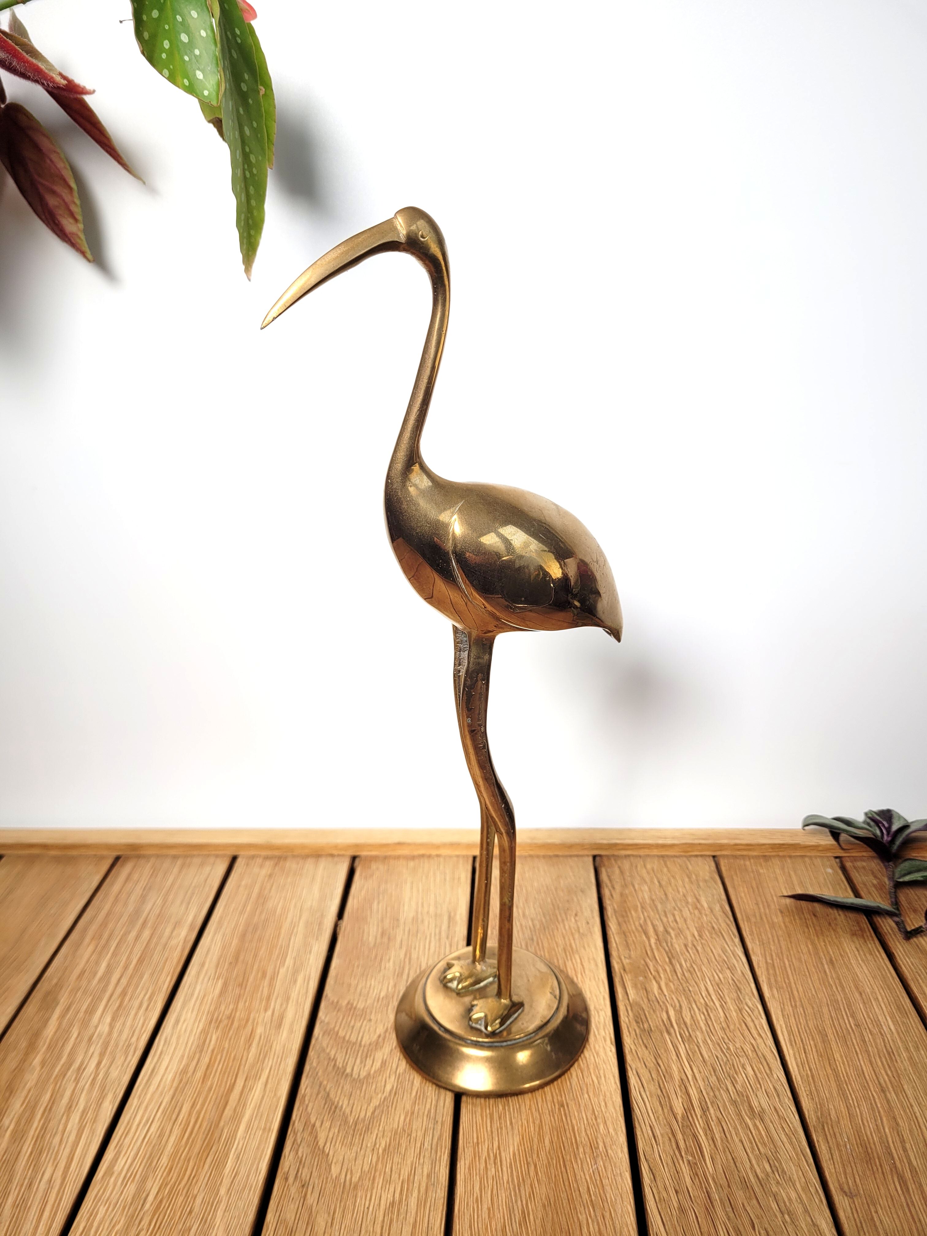 Golden brass blue heron