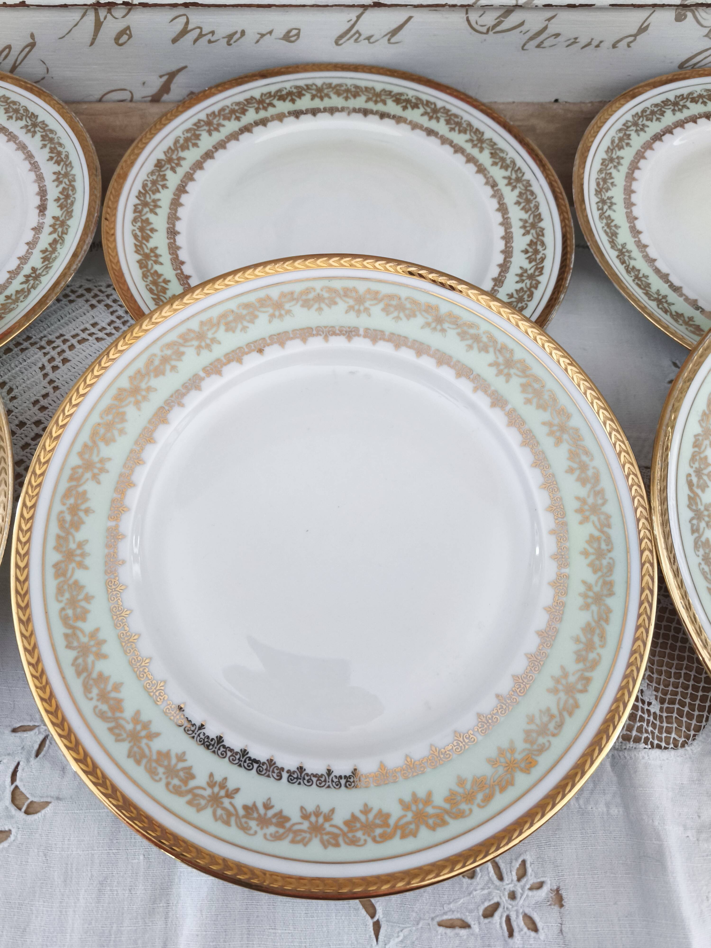 Set of 8 PL France porcelain dinner plates, water green marli and frieze