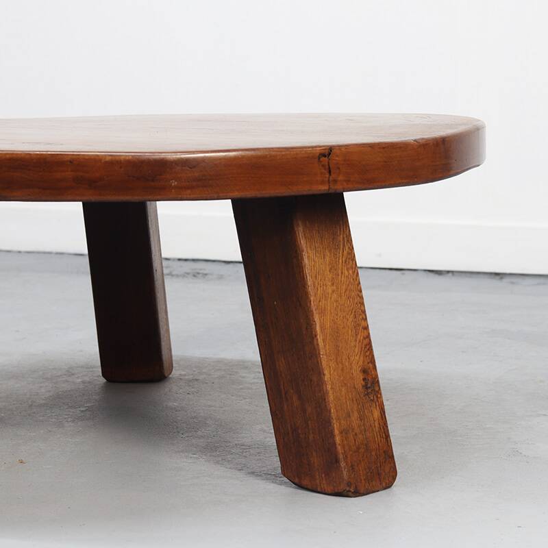 Large vintage round coffee table in raw oak brutalism.