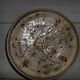 Hand decorated terracotta plate