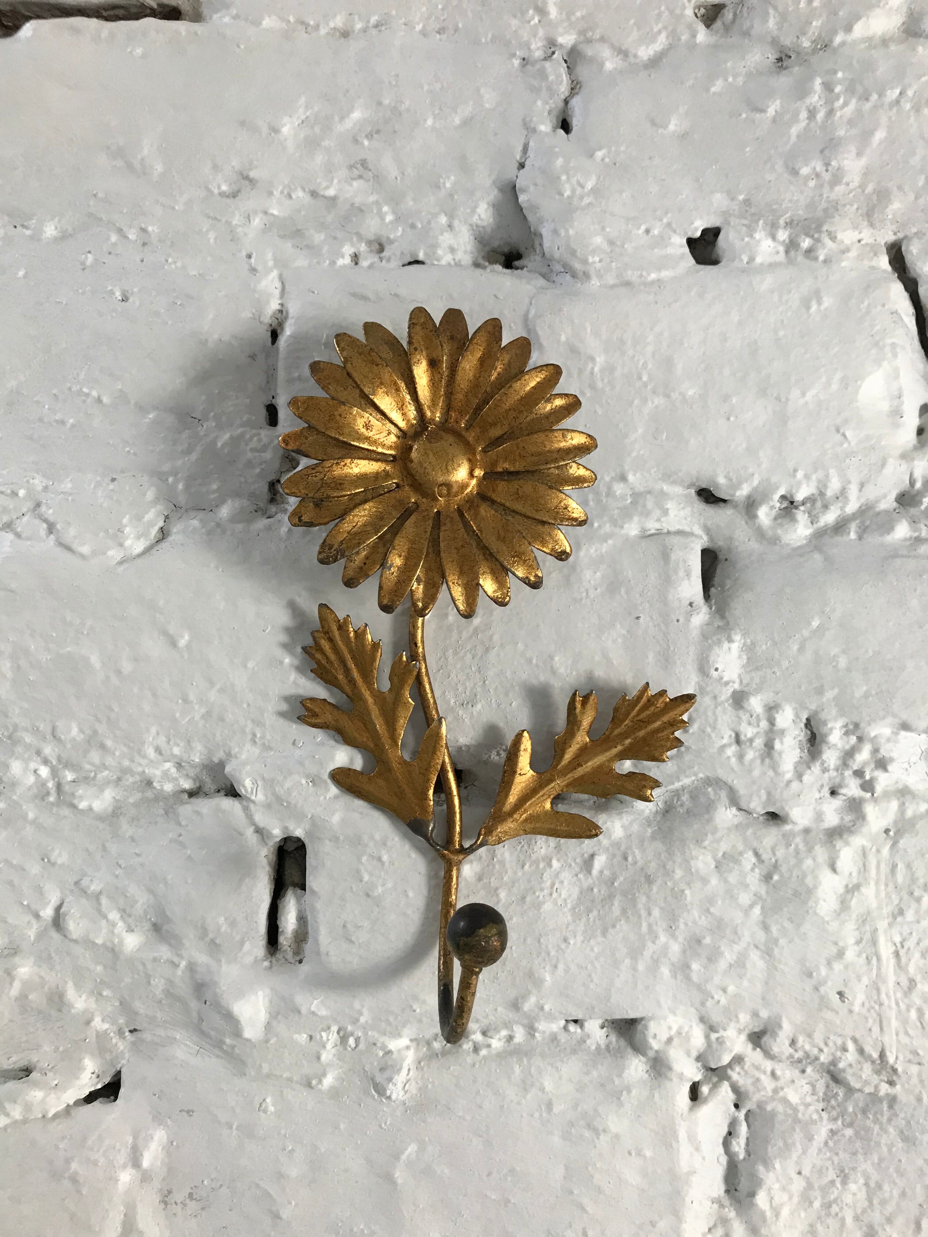 Brass flower patère