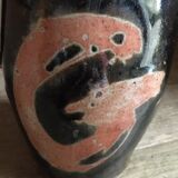 Ceramic pitcher. Belly shape. Motives on both sides