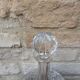 Antique cut crystal decanter with stopper.