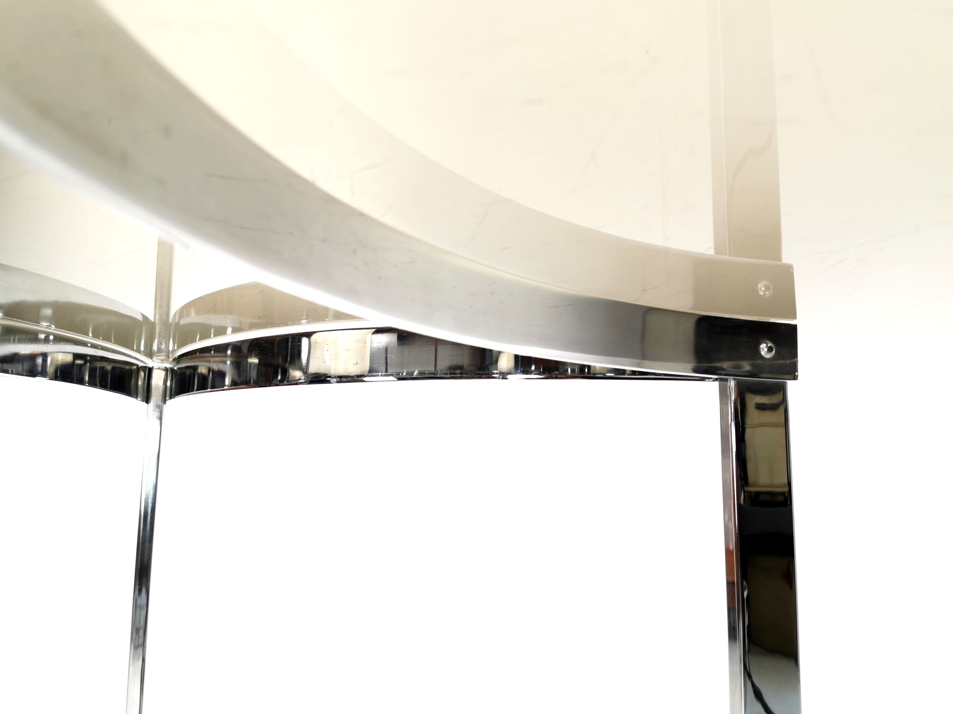 Round table glass chrome Merrow Associates Robert Young