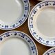 Vintage dessert plates with blue cherry pattern