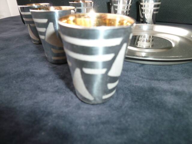 Liqueur service, silver-plated metal shot.
