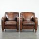 Characterful set of two vintage sheepskin armchairs with beautiful colours