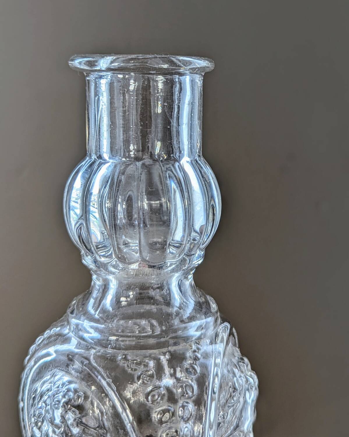Legras candlestick in molded glass with faces in relief, vintage carafe