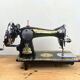 Singer - old sewing machine - black lacquer with golden patterns - very decorative