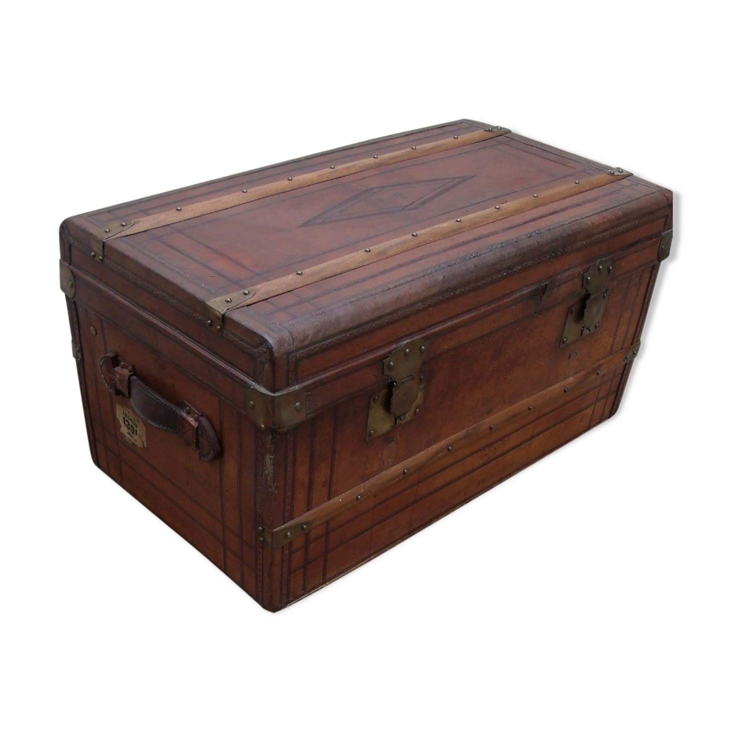 Old wooden trunk covered leather travel chest
