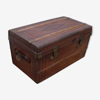 Old wooden trunk covered leather travel chest