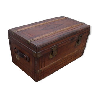 Old wooden trunk covered leather travel chest