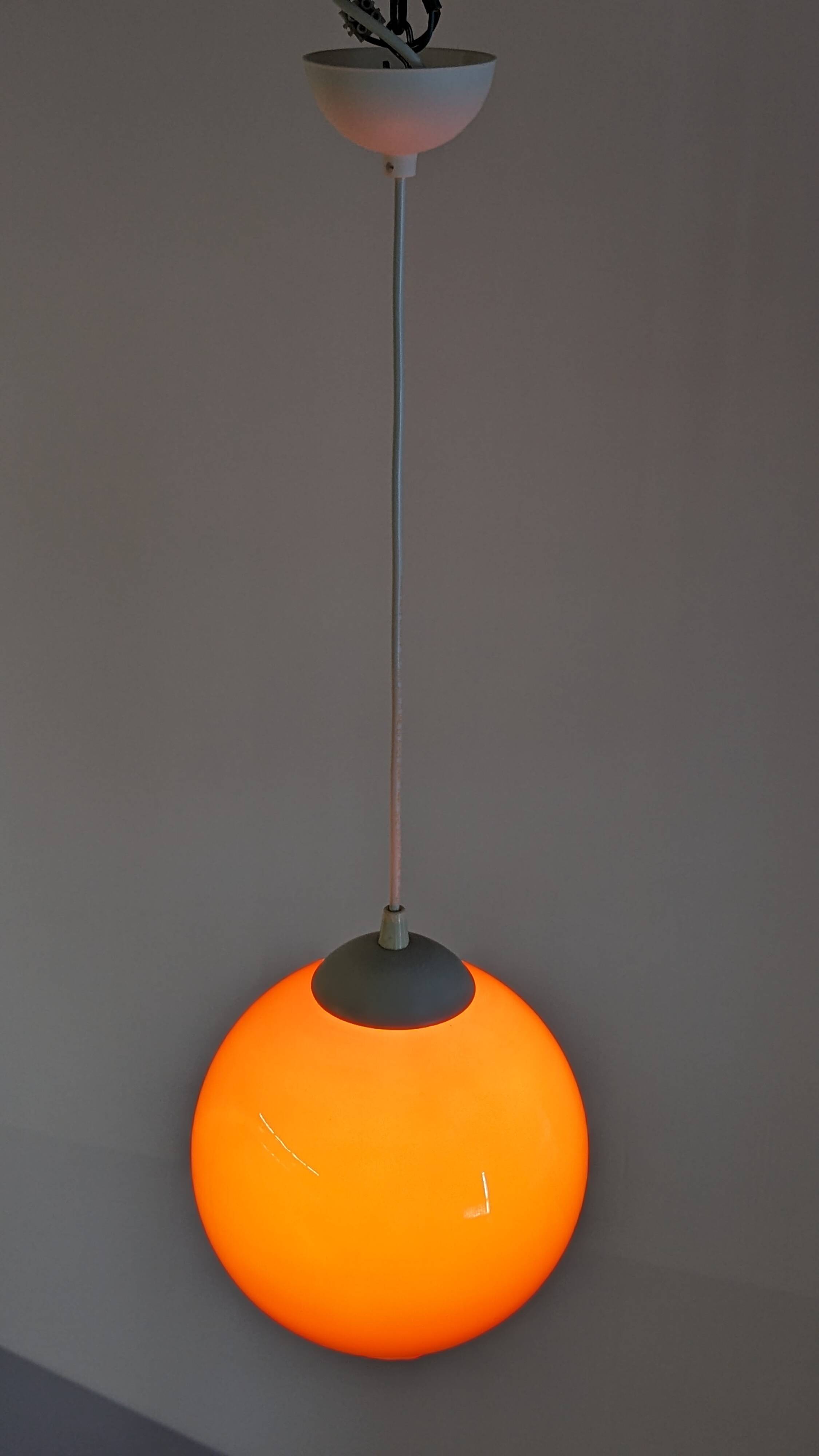 Orange opaline ball pendant, France circa 1970.