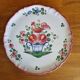 Antique pie dish in St Clément faience with a basket hen motif.
