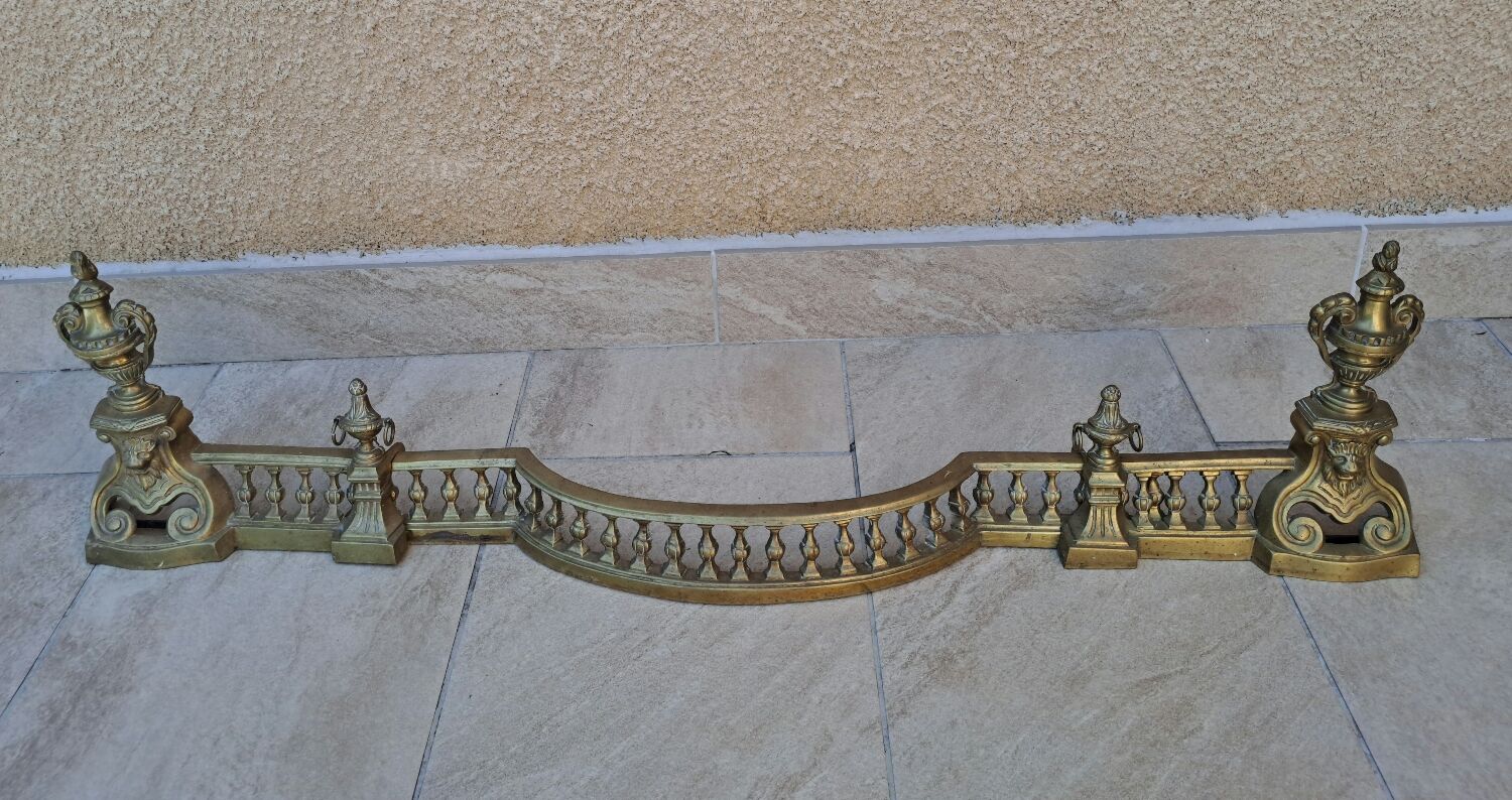 Louis XVI style bronze andirons and fireplace bar