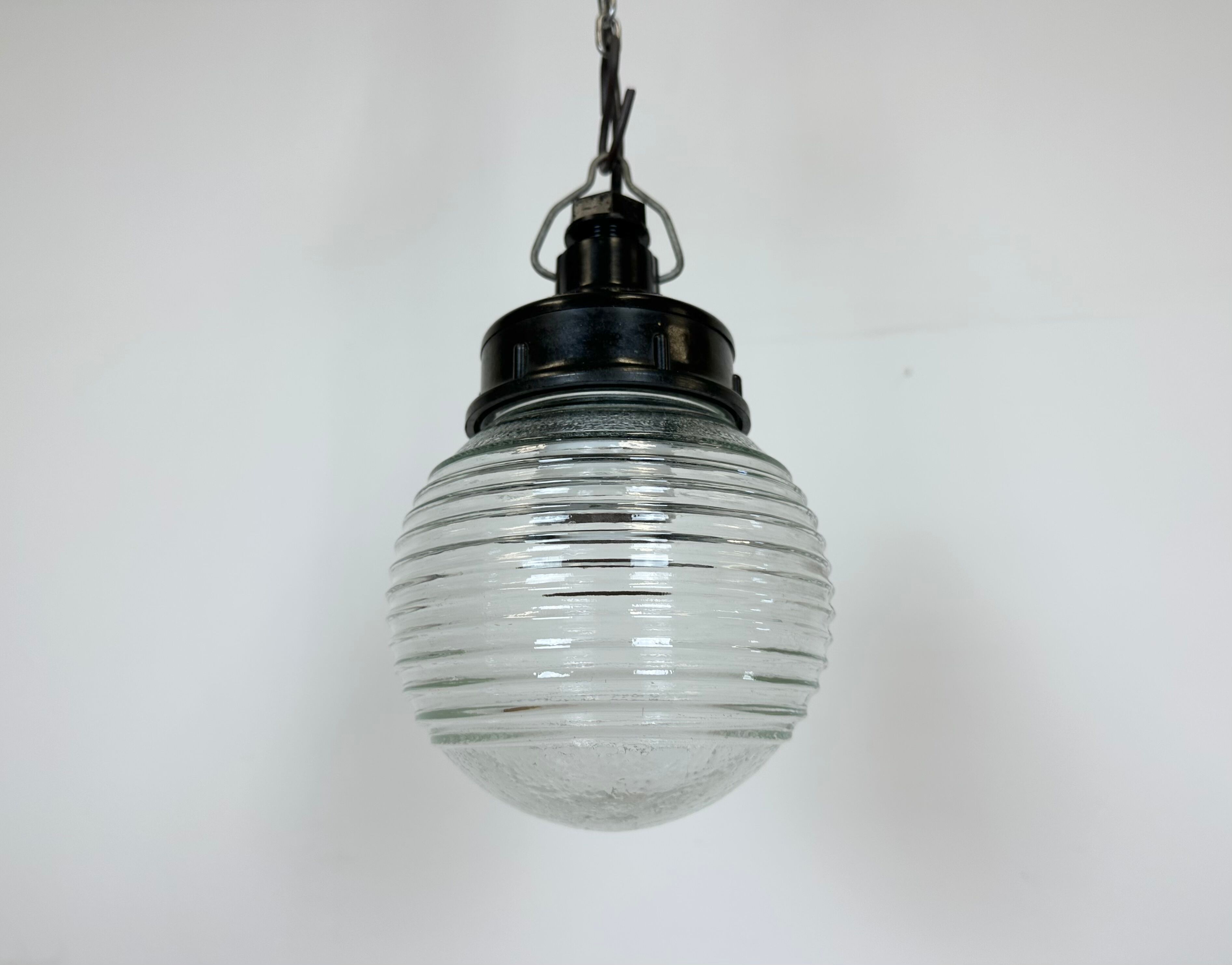 Industrial bakelite pendant light with ribbed glass, 1970s