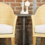 Pair of teak and rattan armchairs