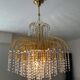 Vintage brass chandelier with crystal tassels cascade