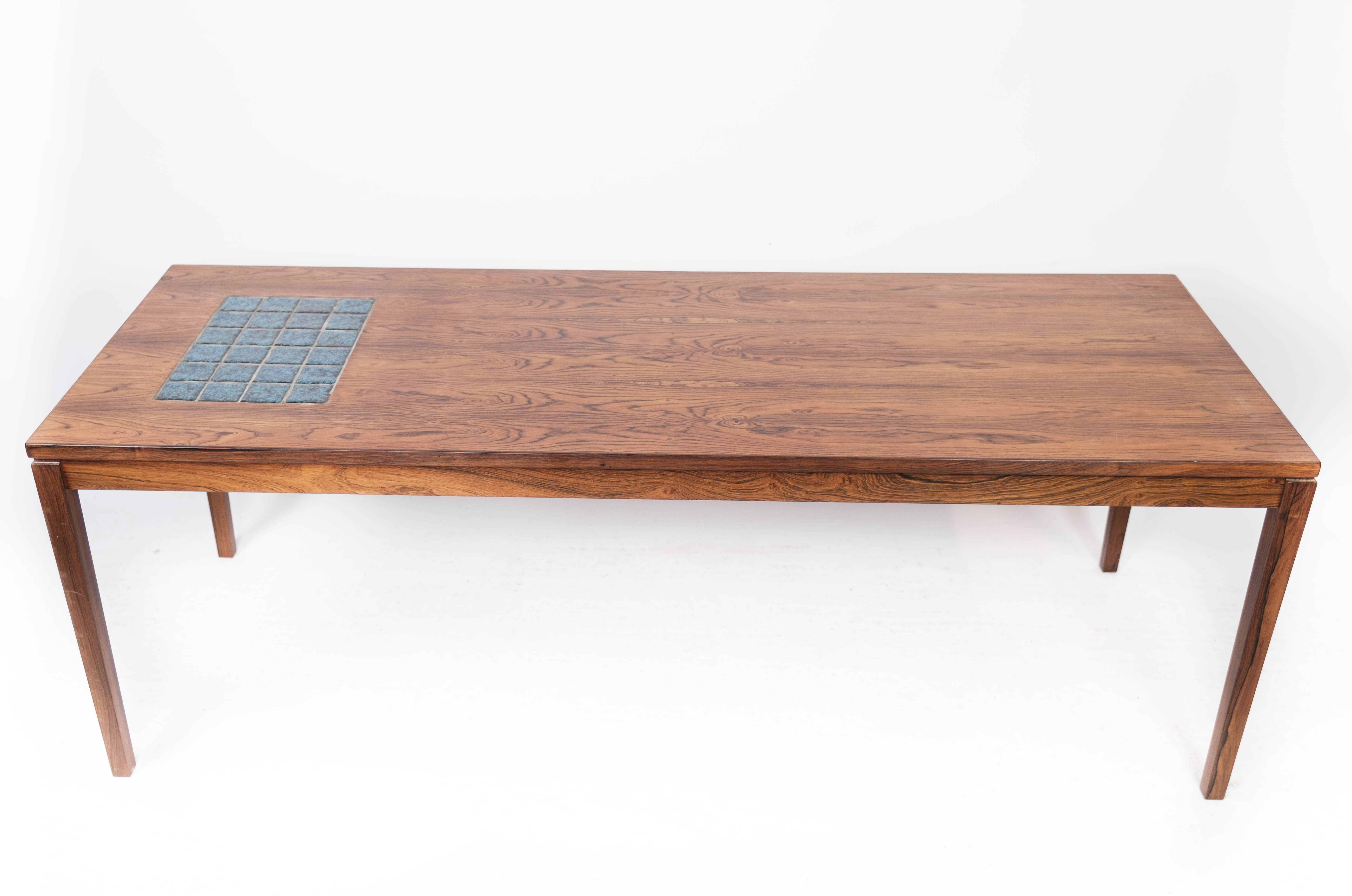 Coffee table in rosewood with blue tiles of Danish design from the 1960s