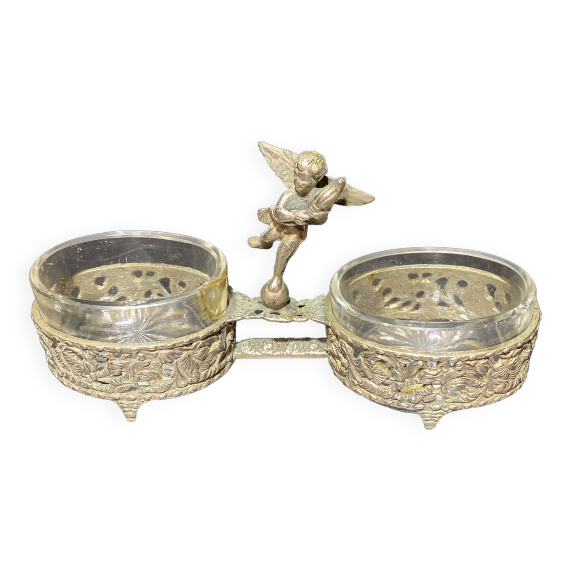 Spice centerpiece and serving spoon topped with a brass cherub