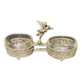 Spice centerpiece and serving spoon topped with a brass cherub