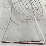 Pair of armchairs in white patinated mesh metal.