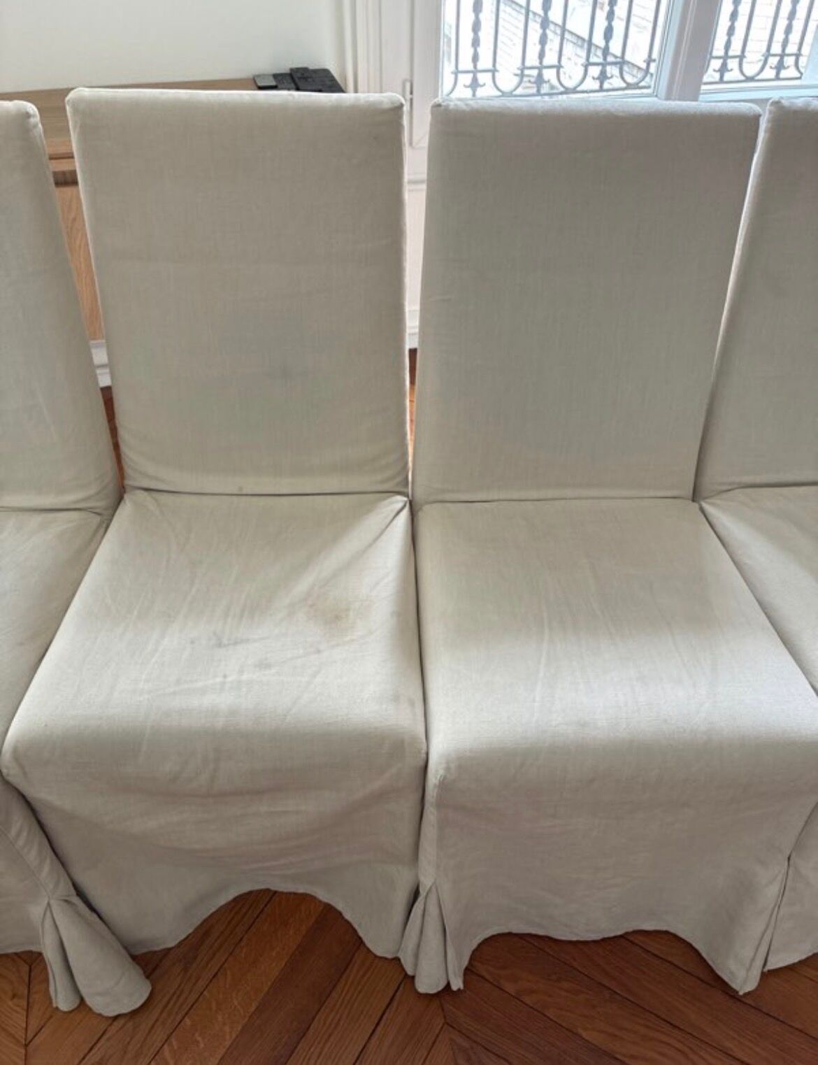 Set of 6 Maxalto chairs with covers.