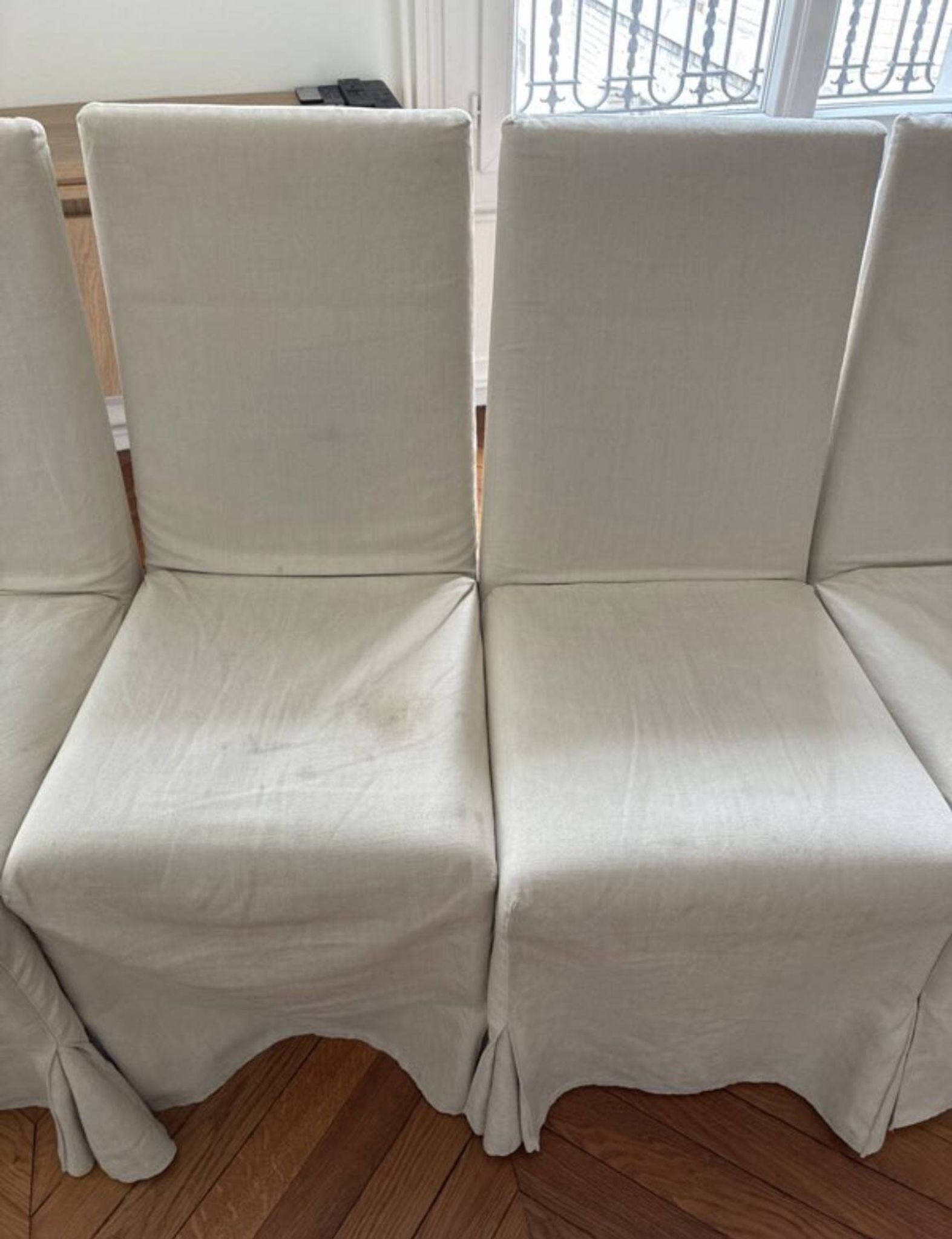 Set of 6 Maxalto chairs with covers.
