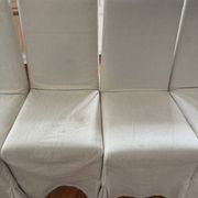 Set of 6 Maxalto chairs with covers.