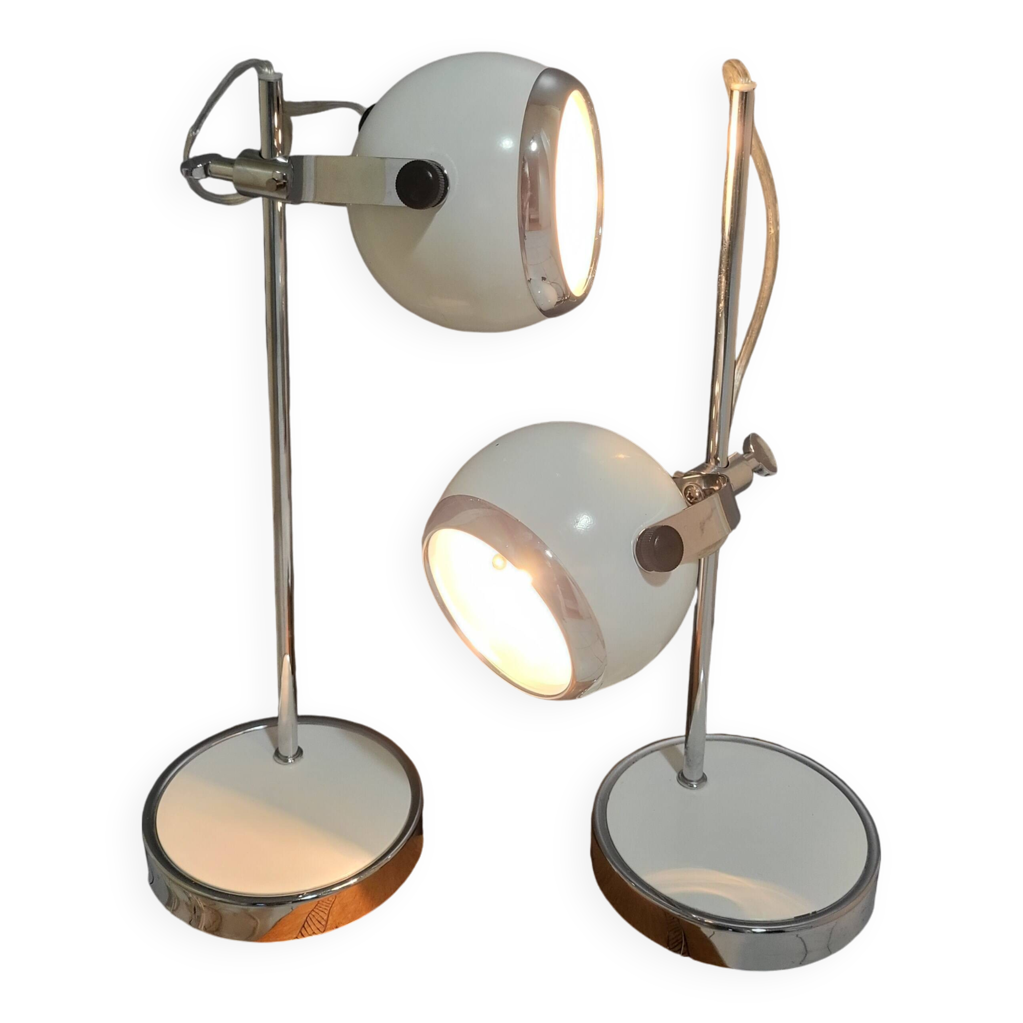 White and chrome metal eye ball lamps