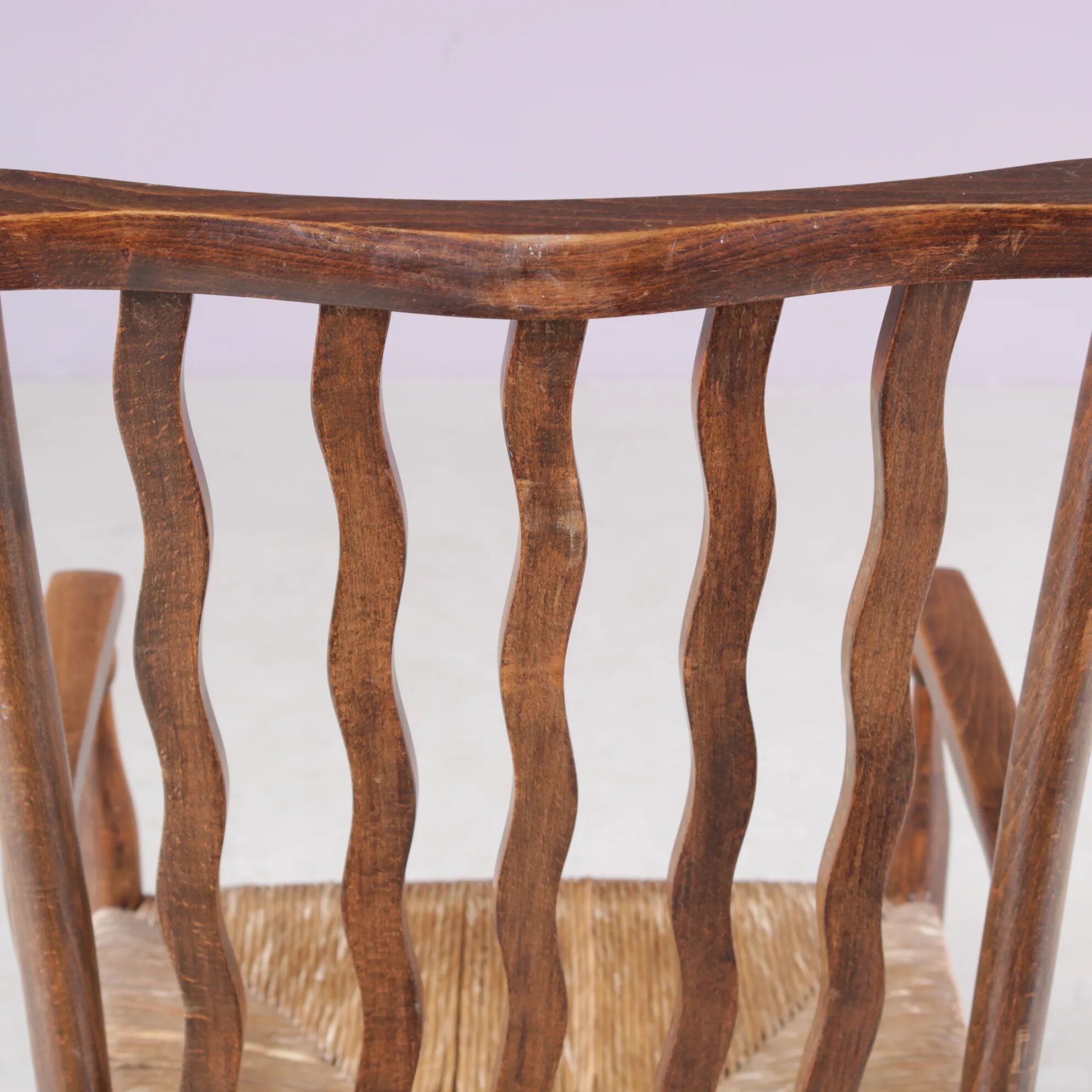 1930s small low spindle-back hearth chair / side chair with wicker seat, Arts & Craft Movement, Morris & Co for Liberty and Co, Stowaway London