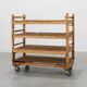 Large baker's cart/ rolling shelf in pine wood, France ca. 1900