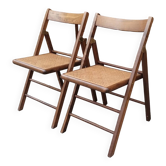 Pair of vintage wooden and cane folding chairs