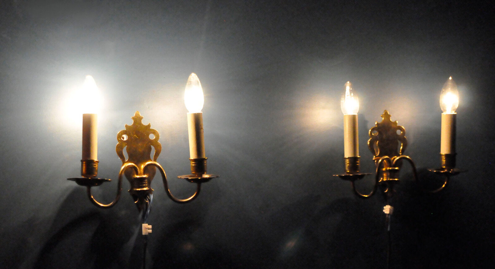 Pair of brass wall sconces by Schroder & Co