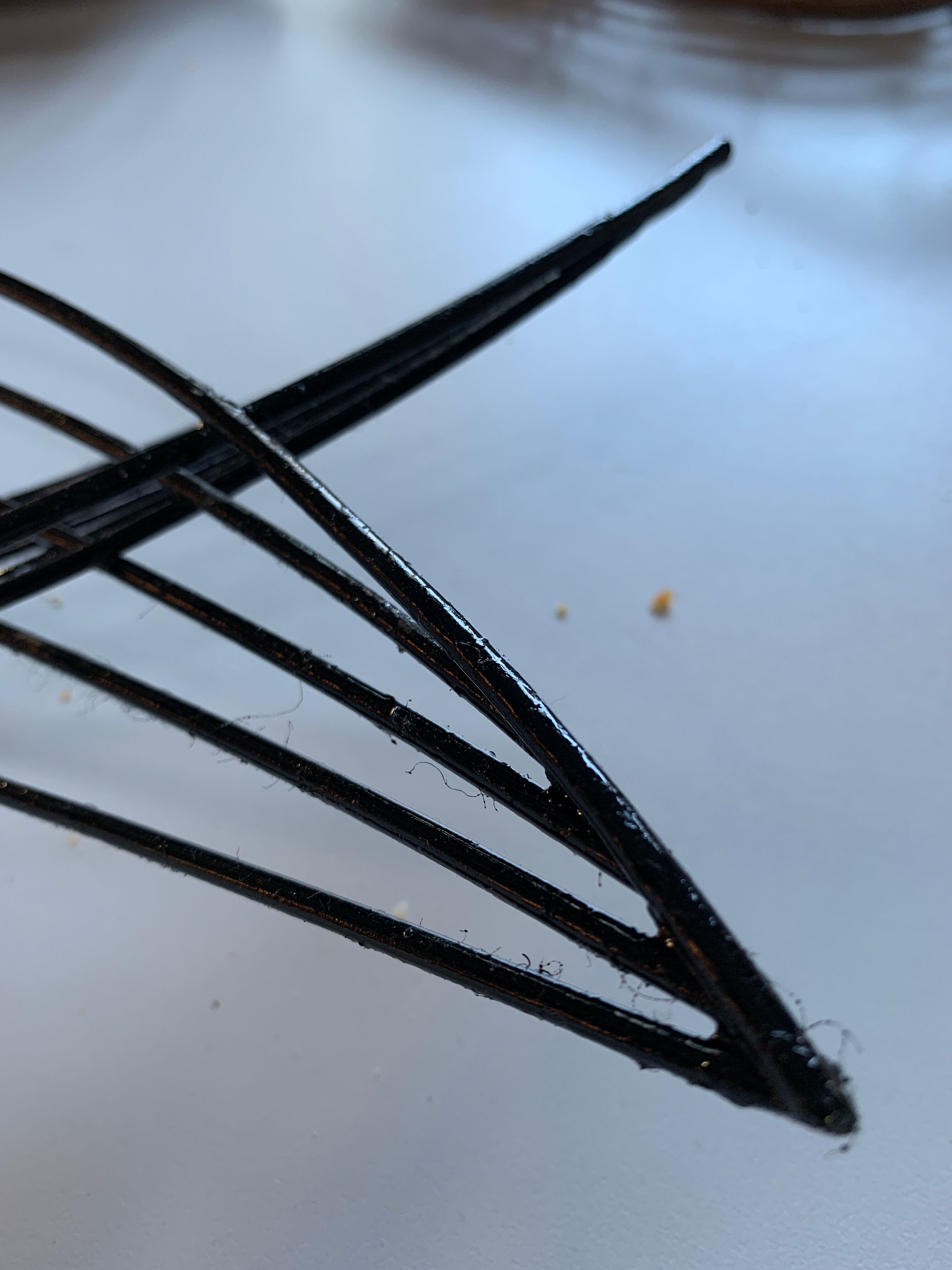 Basket in black lacquered metal "fish"